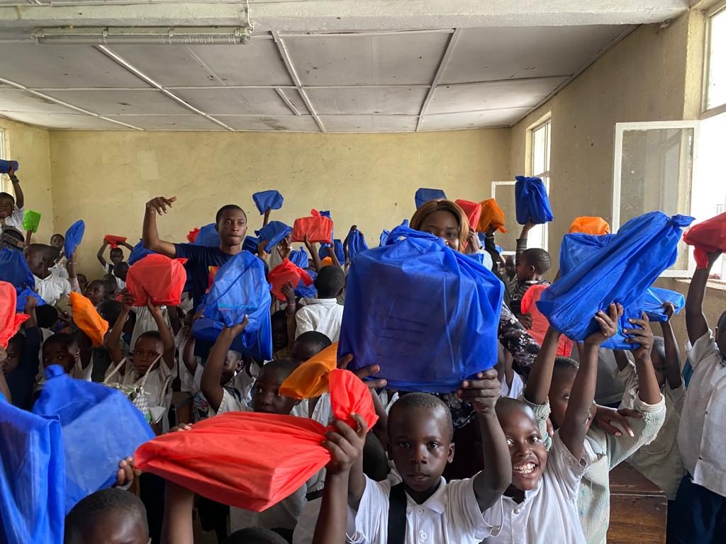 Students receiving school supplies